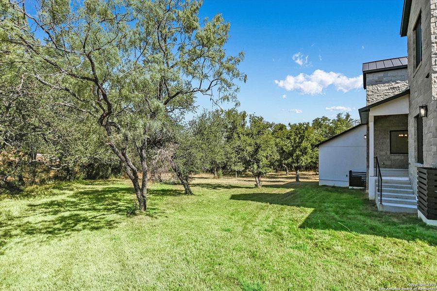 Exterior details and patio area of a home in , Horseshoe Bay (Image 25).