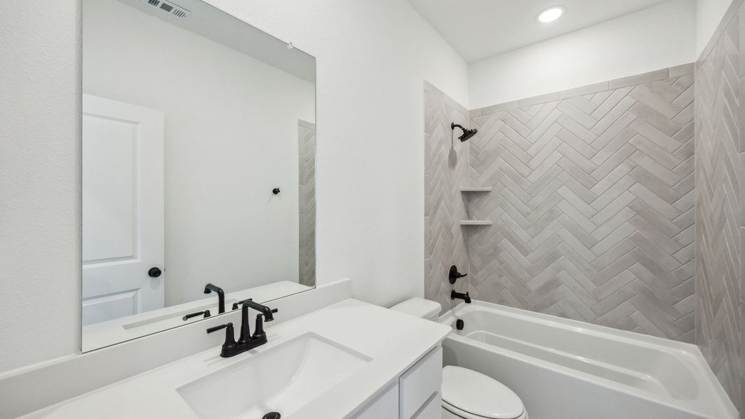 Representative furnished interior of a home built from the Royale II by Normandy Homes in Village on Main Street, Frisco (Image 4).