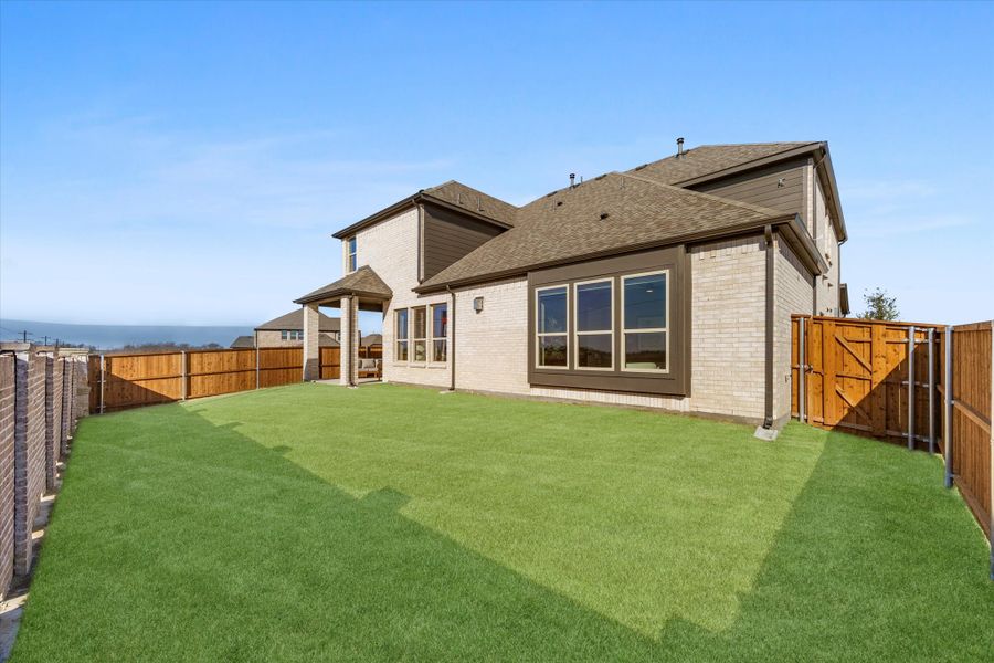 Exterior details and patio area of a home in Brookshire at Legacy Hills, Celina (Image 26).