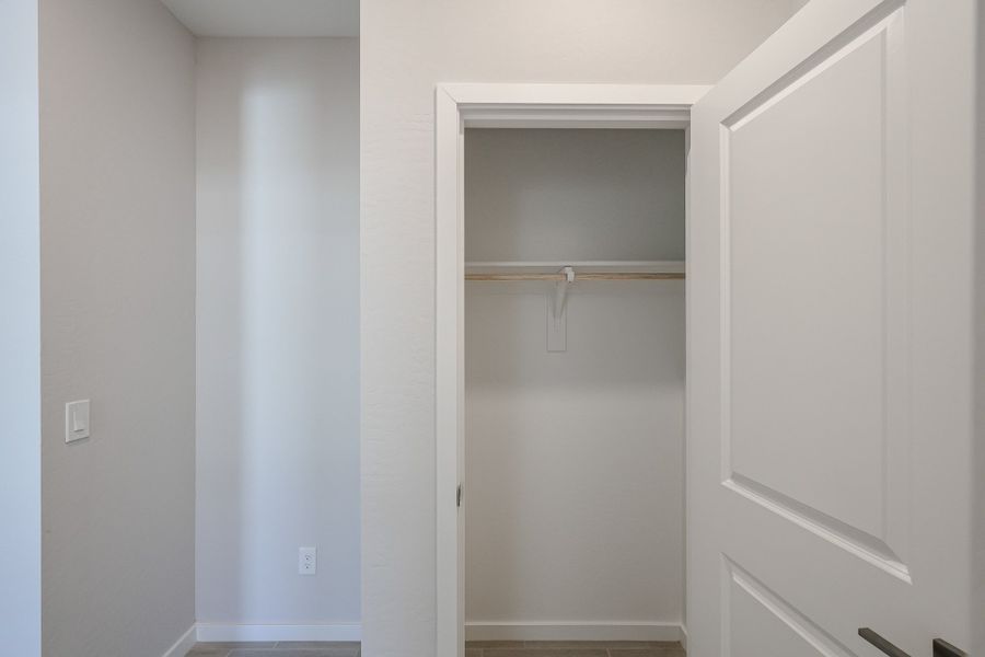 A white door with a glass window.
