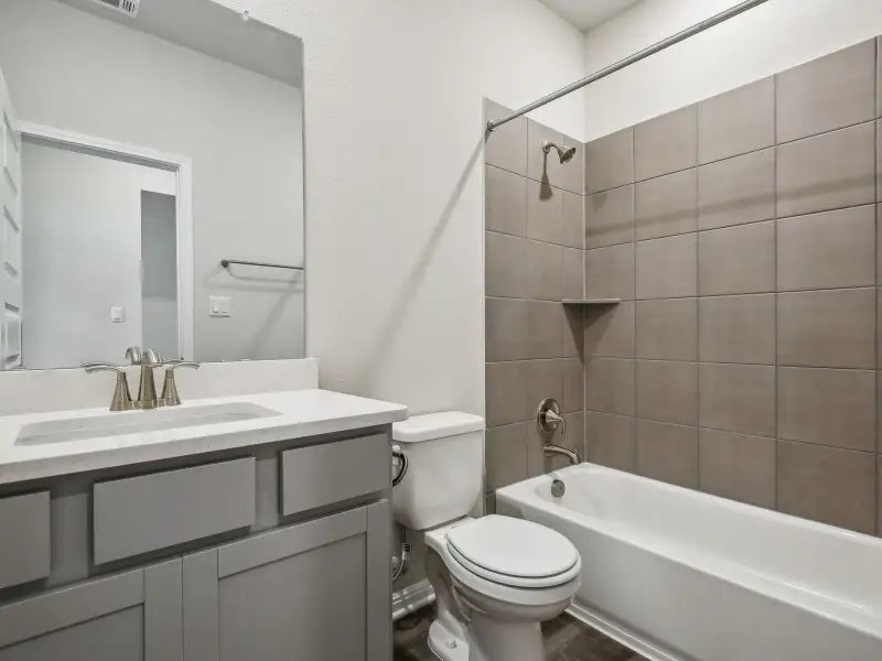 Furnished interior view inside a new home in Big Sky Ranch - Reserve Collection, Dripping Springs (Image 5).