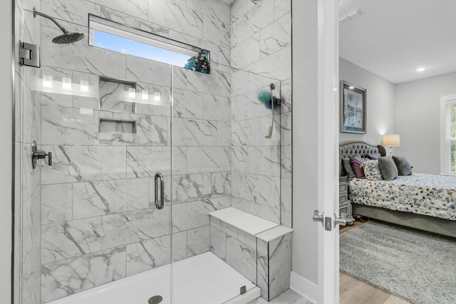 Furnished interior view inside a new home in K. Hovnanian's® Four Seasons at Lakes of Cane Bay, Summerville (Image 34).