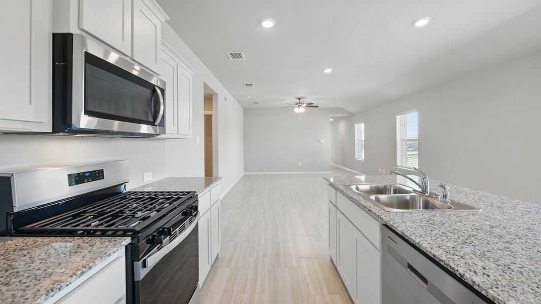 Furnished interior view inside a new home in Springhill South, Boyd (Image 5).