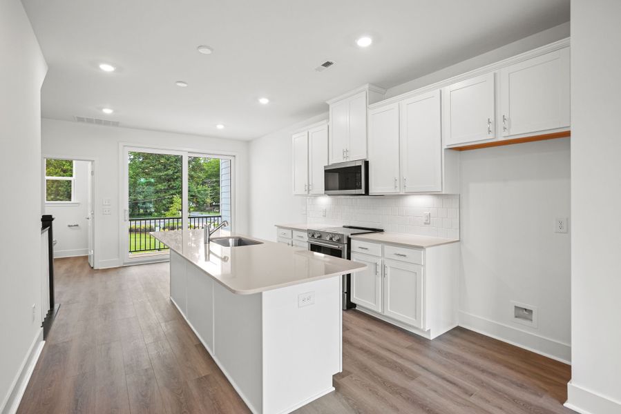Furnished interior view inside a new home in West End Heights, Charlotte (Image 10).