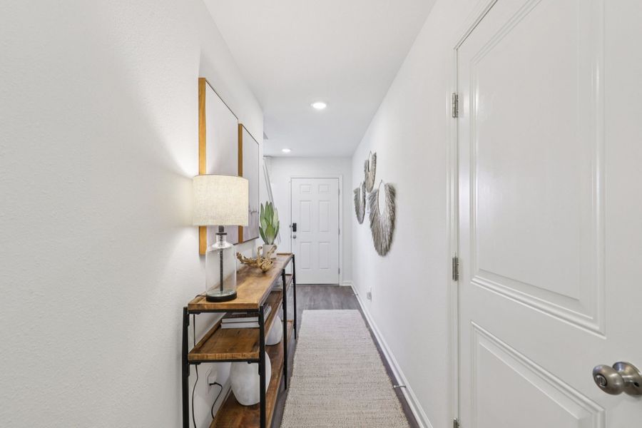 A room with a desk and a lamp. A room with a desk and a lamp.