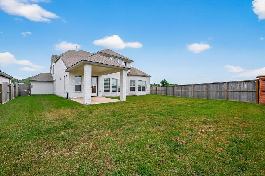 Expansive backyard provides plenty of space for play, pets, or future landscaping and gardening projects.