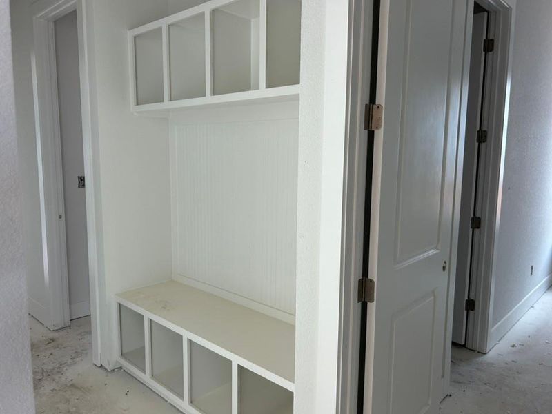 Mudroom with concrete flooring