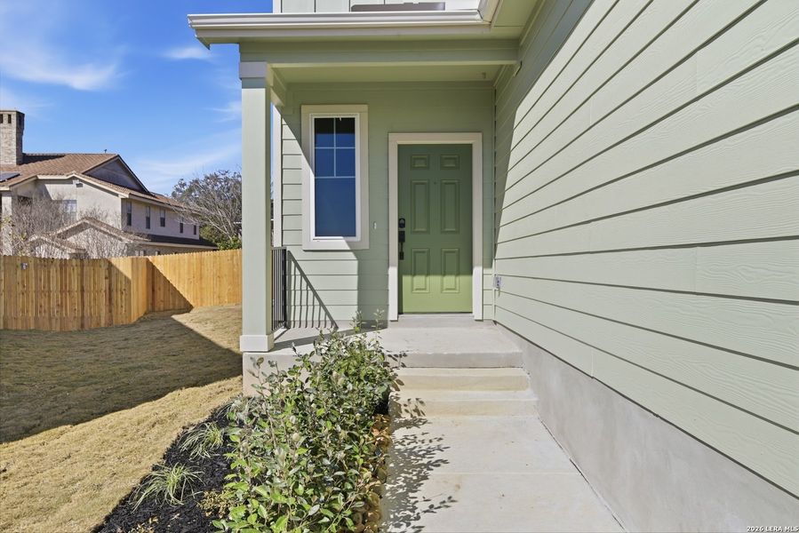Exterior details and patio area of a home in Fairway Crossing, Converse (Image 3).