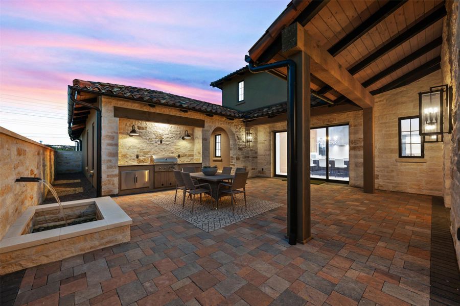 Exquisitely designed for seamless indoor/outdoor living with multiple courtyard & patio areas. Outdoor kitchen & water feature are highlights of the central courtyard.