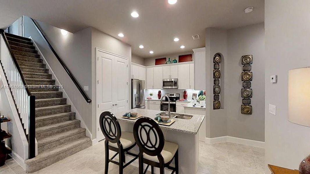 Furnished interior view inside a new home in Westlake Townhomes, Ormond Beach (Image 10).