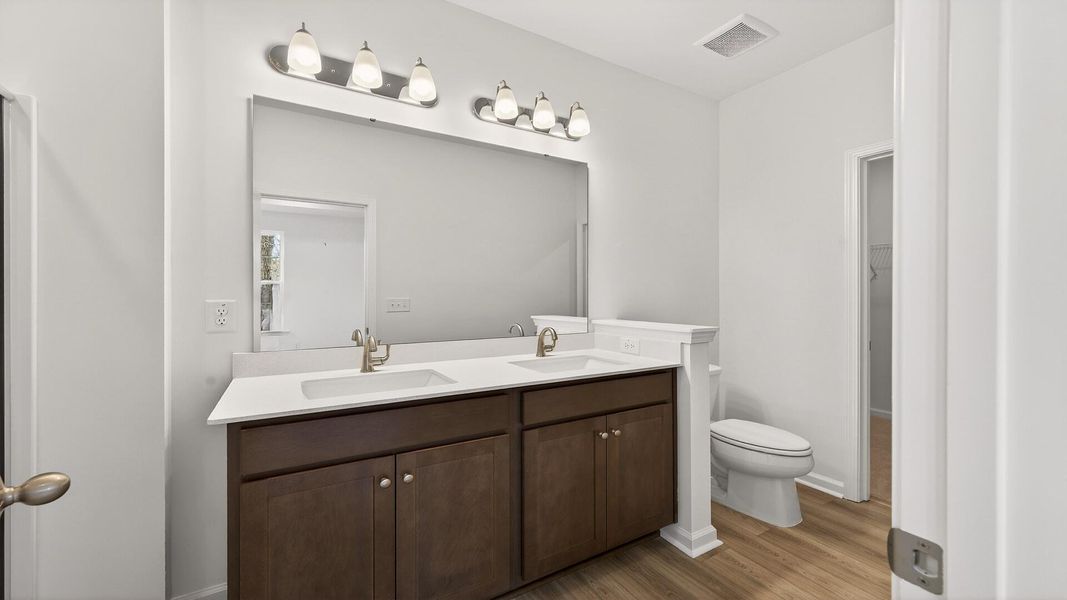 Furnished interior view inside a new home in Creekside at Andrews, Summerville (Image 12). Furnished interior view inside a new home in Creekside at Andrews, Summerville (Image 12).