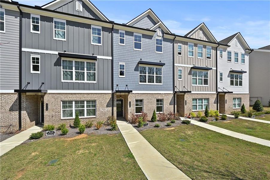 Front exterior of a new home in , Sugar Hill, GA, highlighting curb appeal (Image 25).