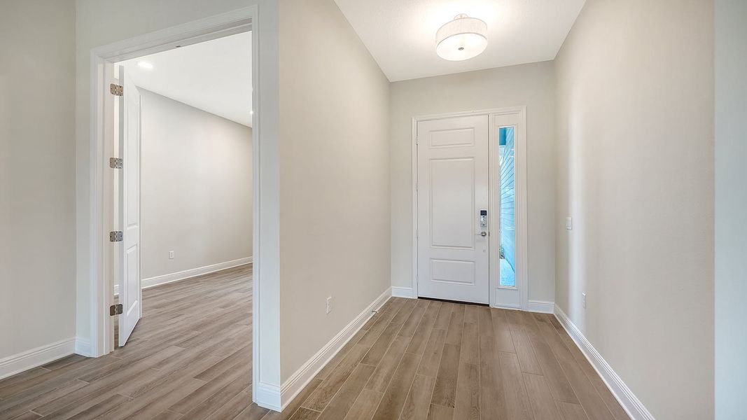 Spacious, unfurnished interior of a new home in Canoe Creek Real Estate and Homes for Sale in Parrish, FL - Neal Communities, Parrish (Image 23).
