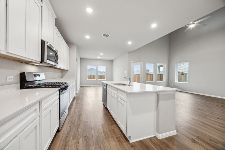 Representative furnished interior of a home built from the Enzo II by Megatel Homes in Sicily, Princeton (Image 5).