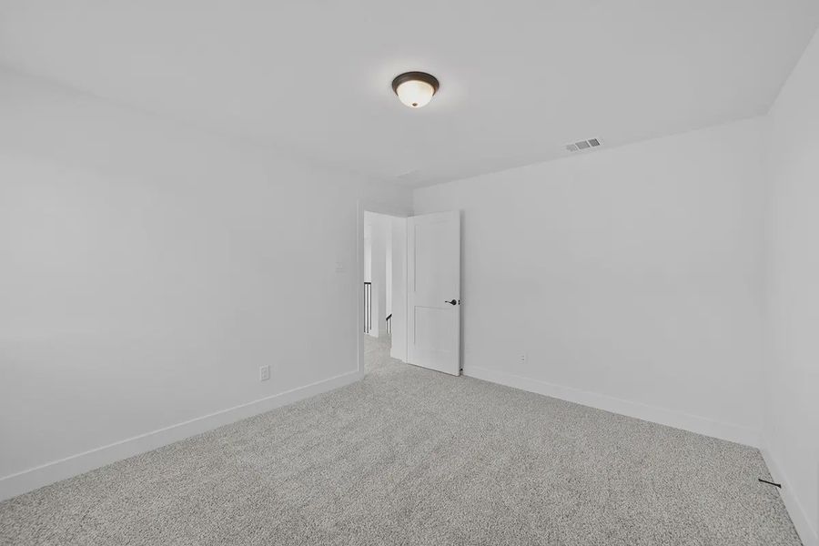 Spacious, unfurnished interior of a new home in Grange, Katy (Image 35).