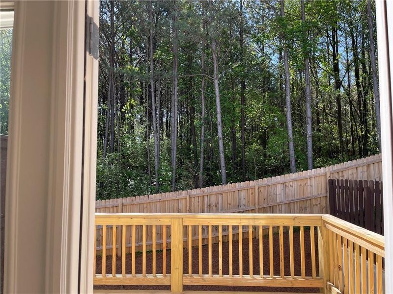 Exterior details and patio area of a home in The Collection at Wolf Creek, Lawrenceville (Image 23).