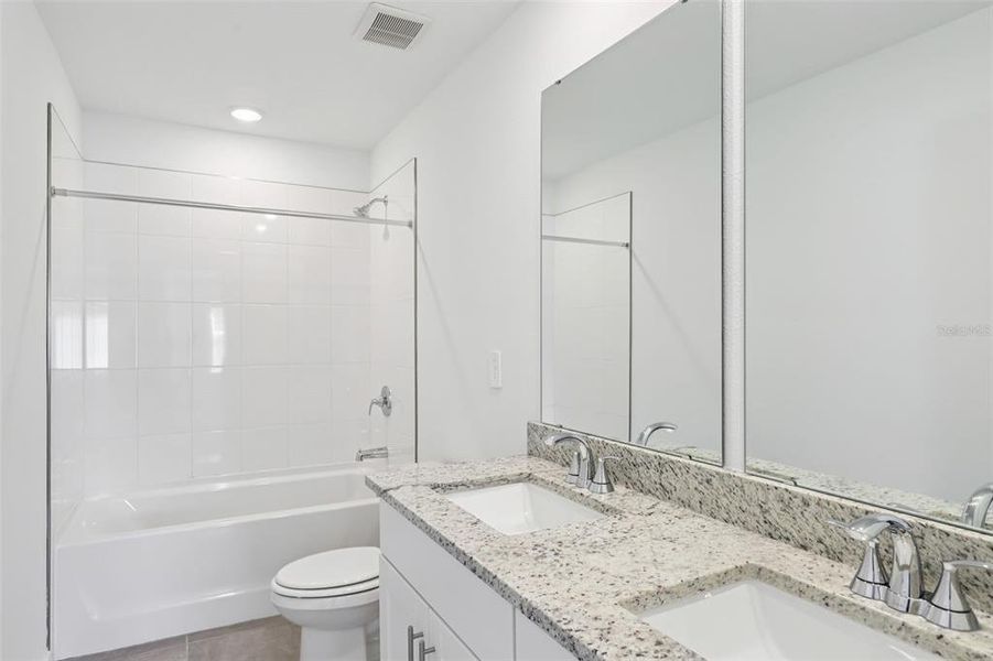 Furnished interior view inside a new home in Flagler Village - Classic Series, Palm Coast (Image 6). Furnished interior view inside a new home in Flagler Village - Classic Series, Palm Coast (Image 6).