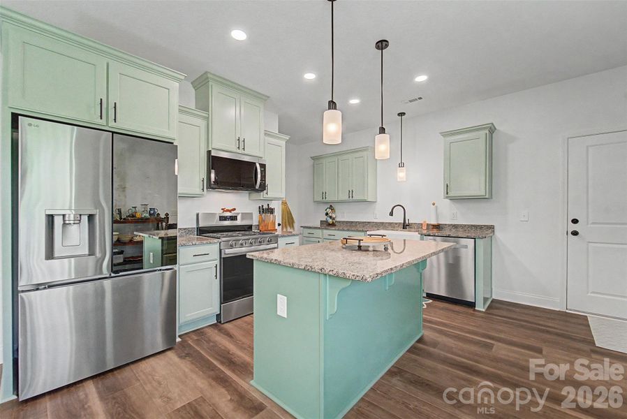 Furnished interior view inside a new home in , Waynesville (Image 7).