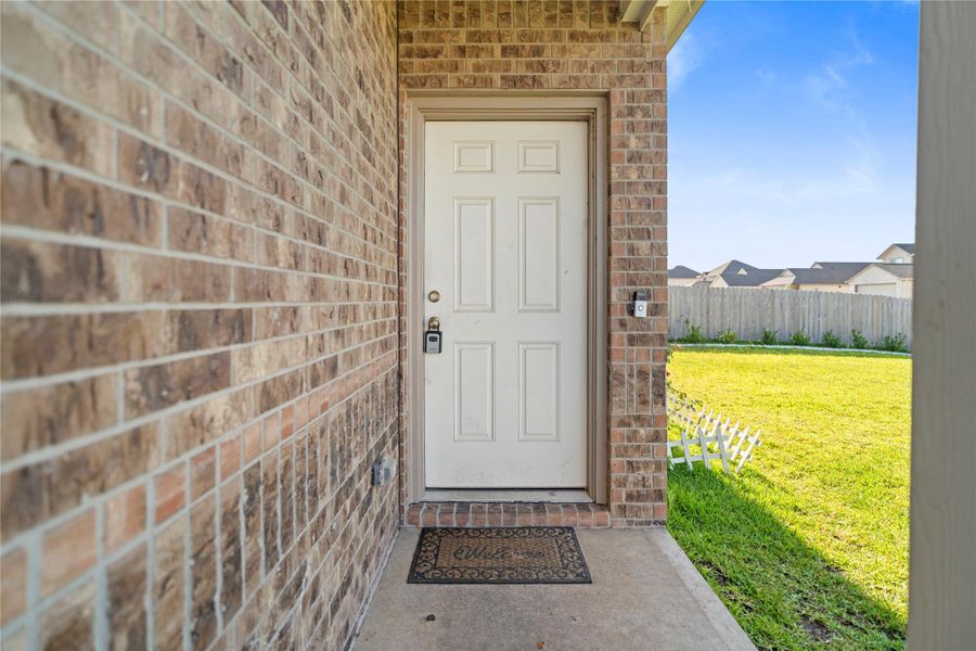 Front exterior of a new home in , Huntsville, TX, highlighting curb appeal (Image 19).