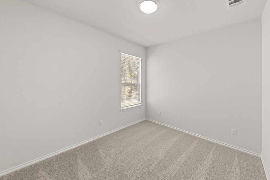 Representative exterior photo of a completed home built from the Birch by Impression Homes in Creekside Ranch, Blue Ridge, TX (Image 22).