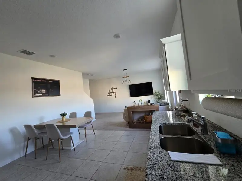 Furnished interior view inside a new home in , Haines City (Image 3).