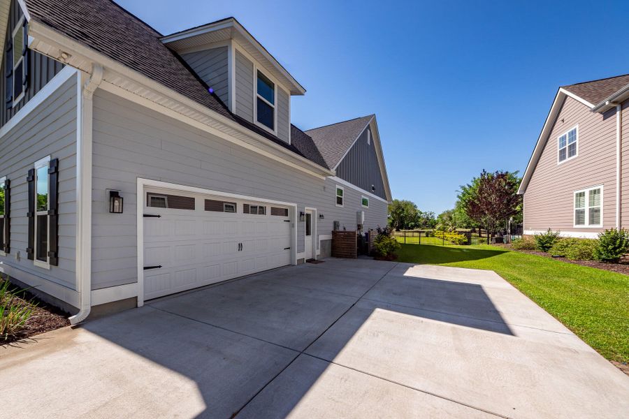 Exterior details and patio area of a home in , Charleston (Image 37).