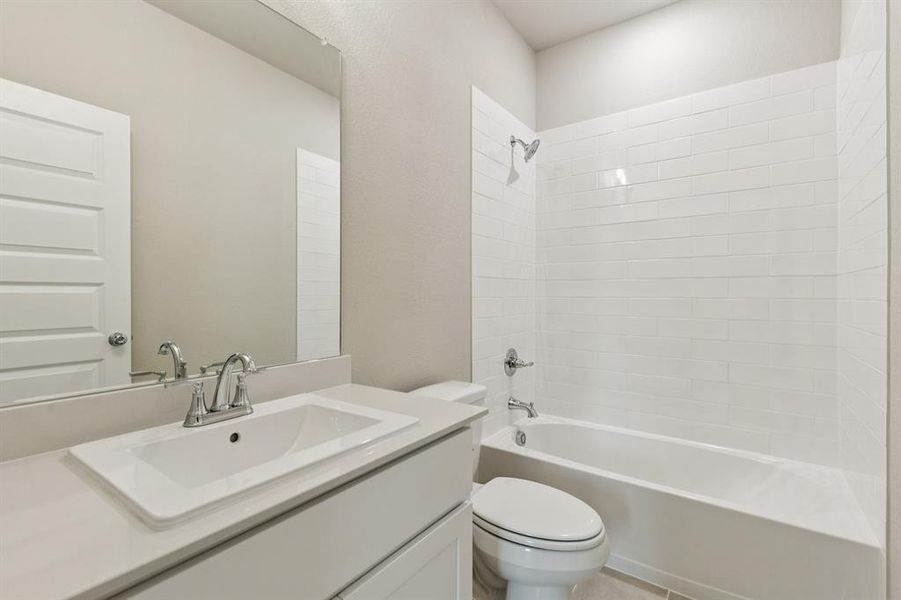 Bathroom in the Emmy II home plan by Trophy Signature Homes - REPRESENTATIVE PHOTO Bathroom in the Emmy II home plan by Trophy Signature Homes - REPRESENTATIVE PHOTO