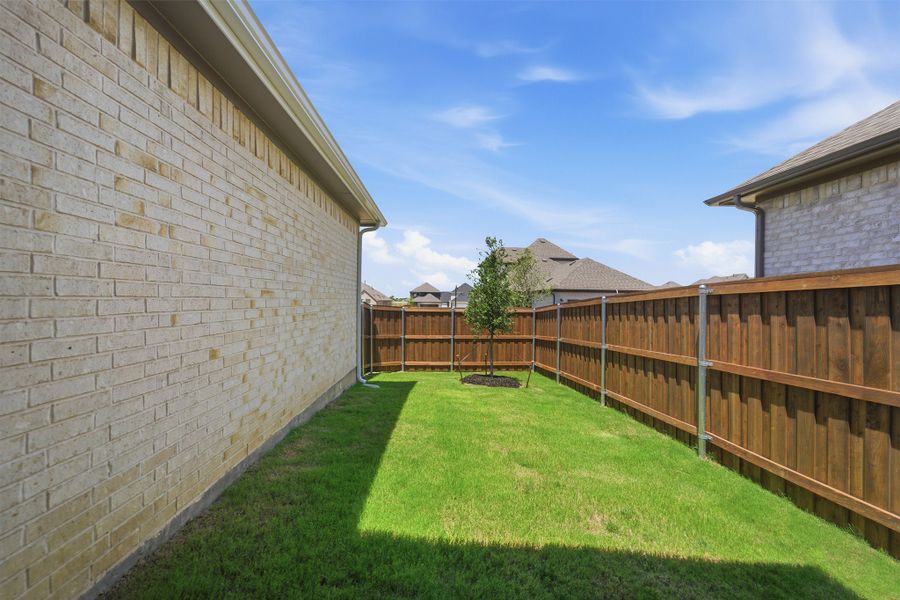 Exterior details and patio area of a home in La Terra, Celina (Image 21). Exterior details and patio area of a home in La Terra, Celina (Image 21).