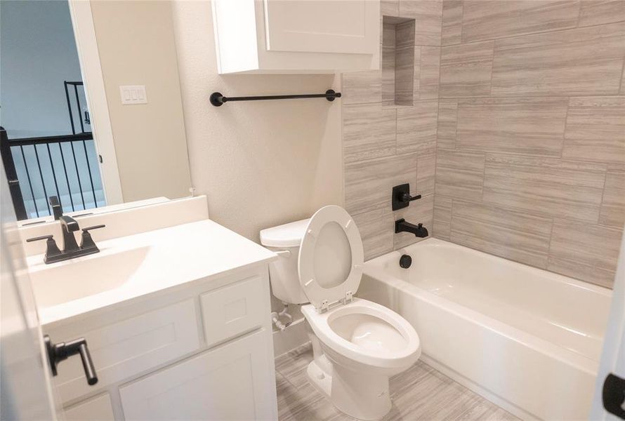 Furnished interior view inside a new home in , Little Elm (Image 11).