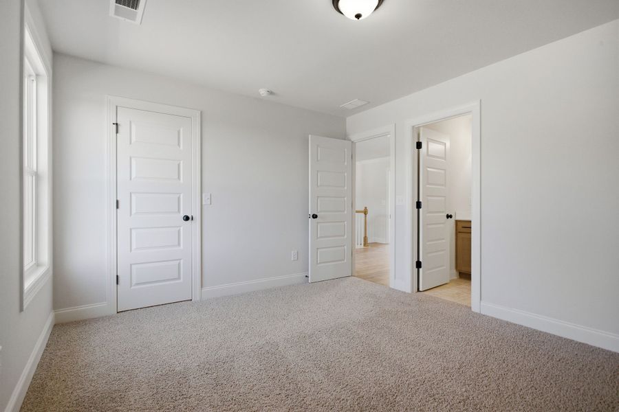 Spacious, unfurnished interior of a new home in Cherokee Knoll, Williamston (Image 32).