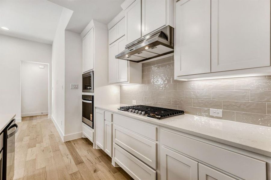 Furnished interior view inside a new home in Castle Hills Northpointe - Townhomes, Lewisville (Image 7).