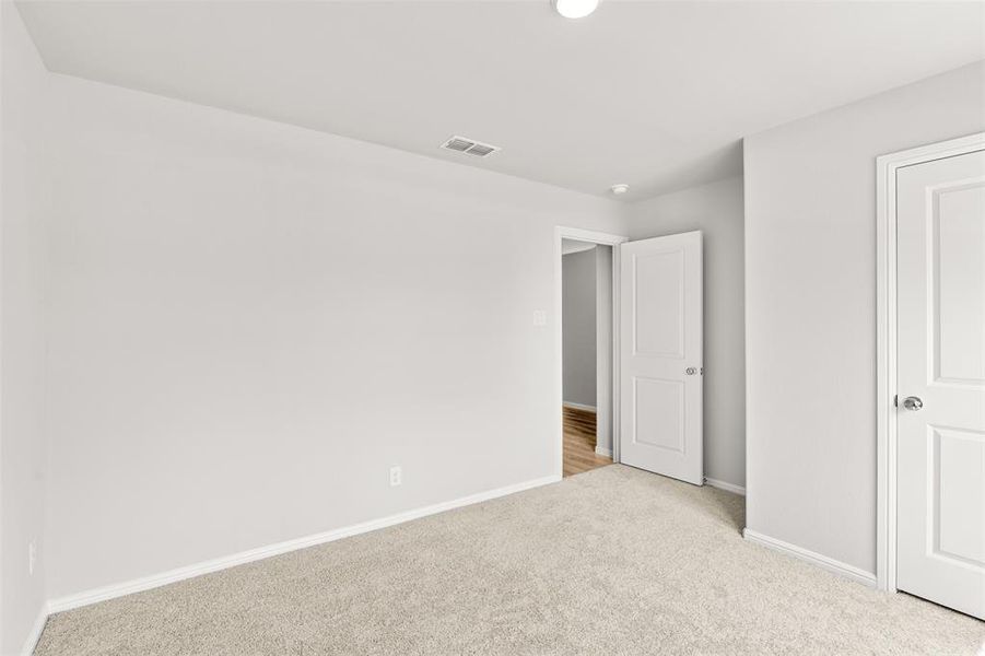 Spacious, unfurnished interior of a new home in Verandah, Royse City (Image 32).