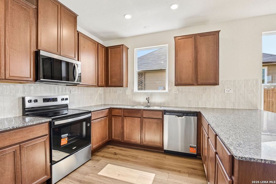 Furnished interior view inside a new home in Woodside Farms, Seguin (Image 9).