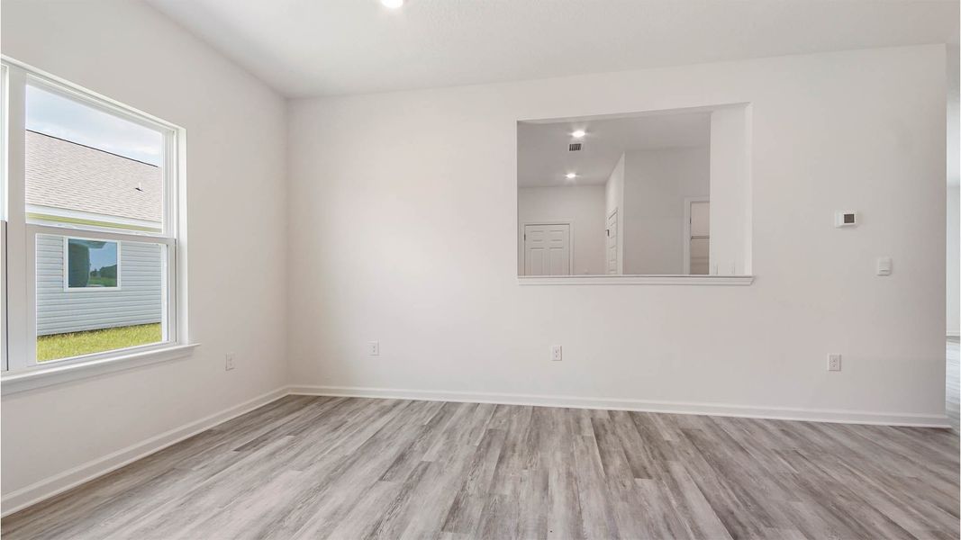 Representative unfurnished interior of a home built from the Aspen by D.R. Horton in Owl's Head East, Freeport (Image 21).