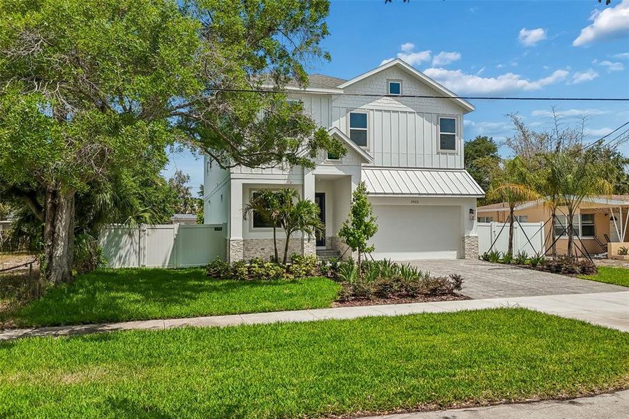 Front exterior of a new home in , Tampa, FL, highlighting curb appeal (Image 29).