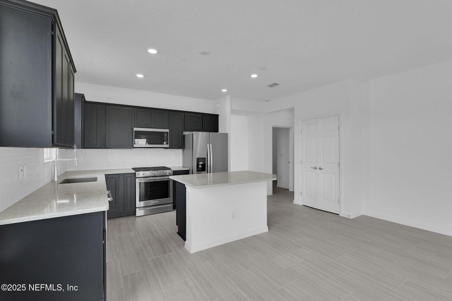Furnished interior view inside a new home in Del Webb Wildlight, Yulee (Image 4).