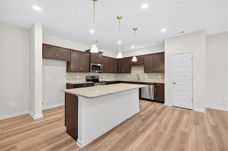 Furnished interior view inside a new home in Jameson Towns, Villa Rica (Image 9).