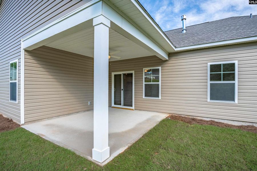 Exterior details and patio area of a home in Rolling Hills, Prosperity (Image 21).