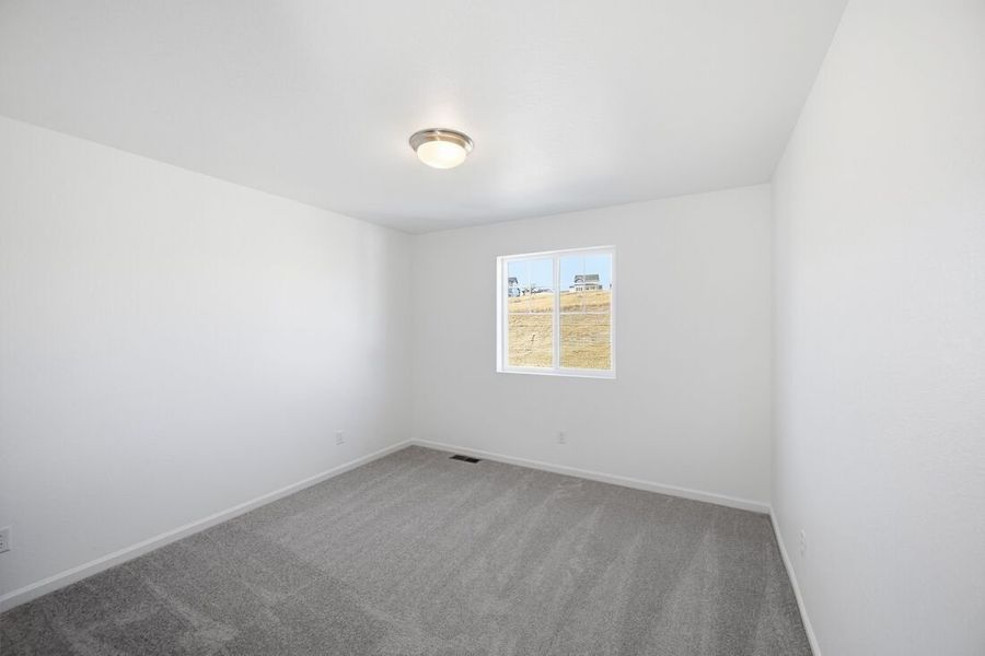 Spacious, unfurnished interior of a new home in The Town Collection at Independence, Elizabeth (Image 16).