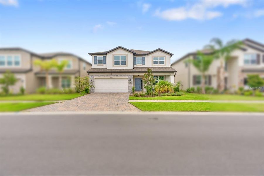Front exterior of a new home in , Tampa, FL, highlighting curb appeal (Image 30).