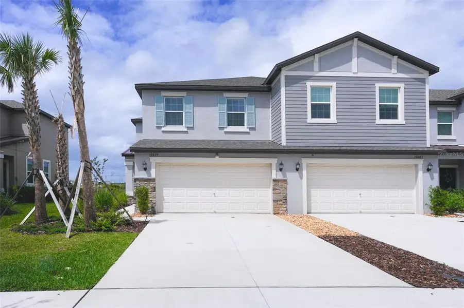 Front exterior of a new home in , San Antonio, FL, highlighting curb appeal (Image 23).