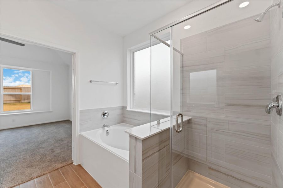 Furnished interior view inside a new home in Sunterra, Katy (Image 9).