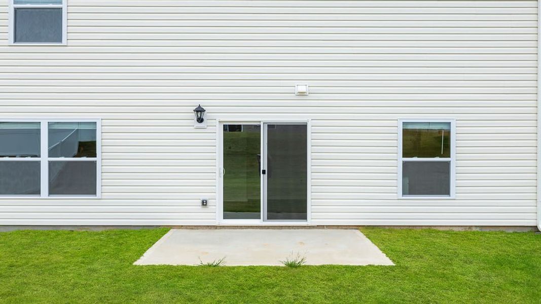 Exterior details and patio area of a home in Lakestone, Woodruff (Image 22).