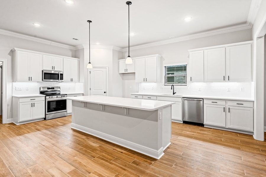 Furnished interior view inside a new home in Bird Song at Hammock Bay, Freeport (Image 7).