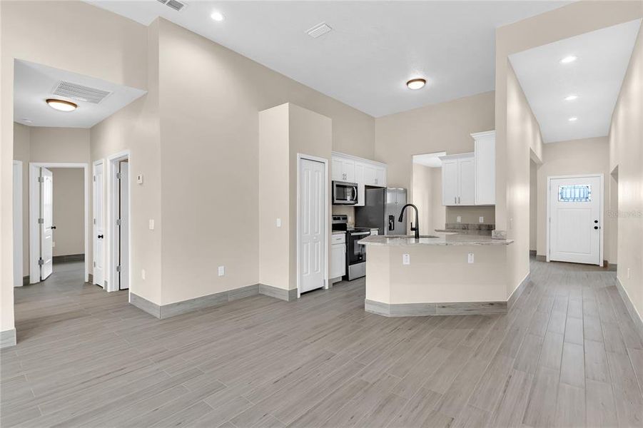 Furnished interior view inside a new home in , Kissimmee (Image 9).