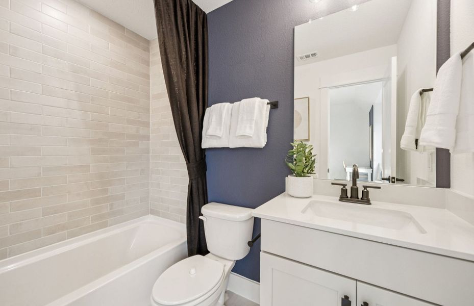 Representative furnished interior of a home built from the Rainier by Pulte Homes in Parks of Village Creek, Burleson (Image 22).