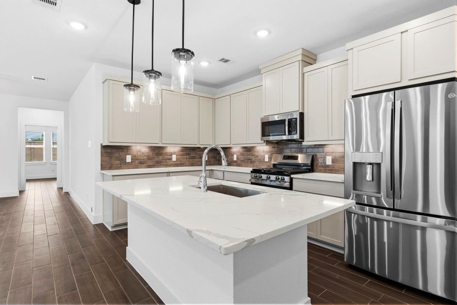 Furnished interior view inside a new home in Meridiana, Manvel (Image 6).