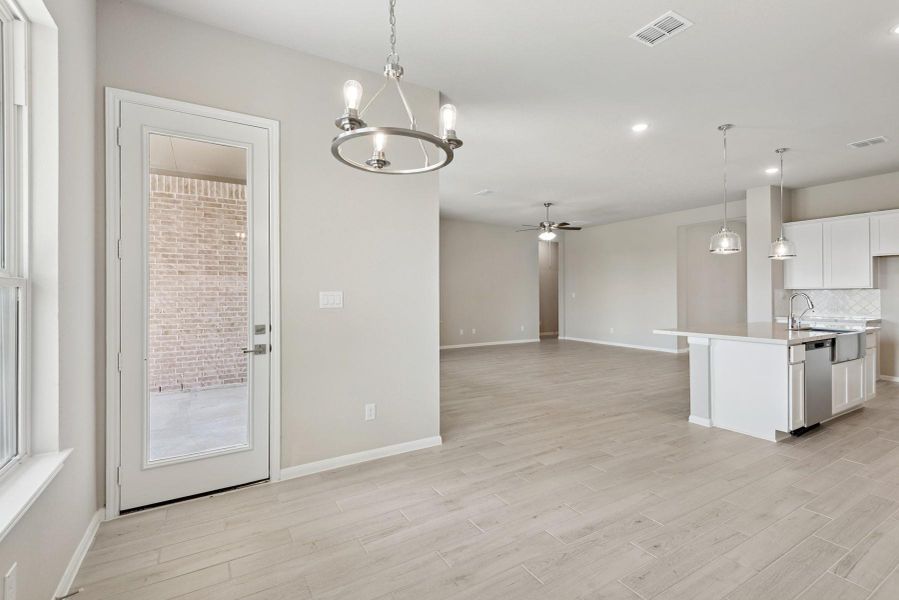 Sun-lit dining area Sun-lit dining area