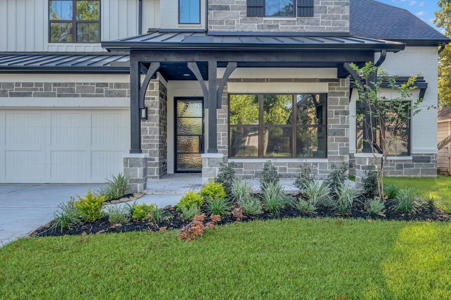Closer look at the inviting front porch and detailed stonework. Closer look at the inviting front porch and detailed stonework.