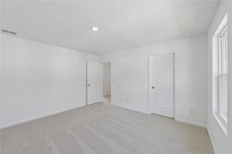 Spacious, unfurnished interior of a new home in Windance Lake, Loganville (Image 31).